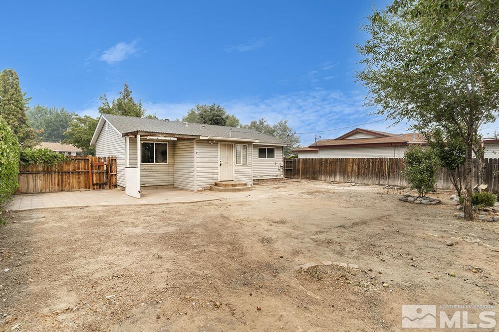 3408 Rauscher Drive Reno, NV 89503 - Photo 13 of 16 a front view of a house with a yard