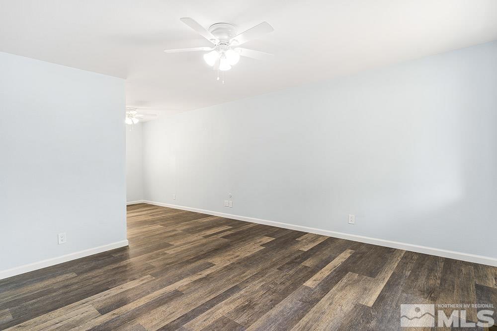 3408 Rauscher Drive Reno, NV 89503 - Photo 3 of 16 an empty room with wooden floor and fan