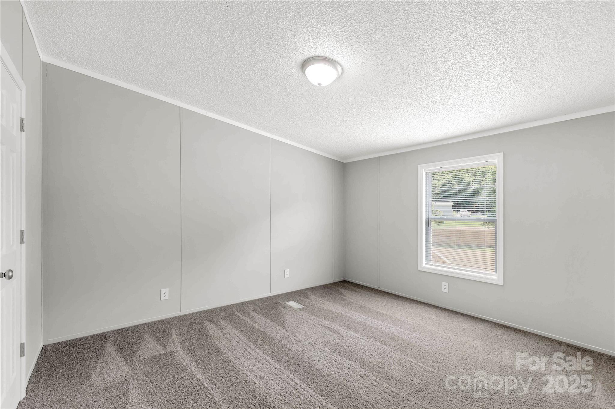 2007 Sugar Hill Road York, SC 29745 - Photo 21 of 36 an empty room with windows