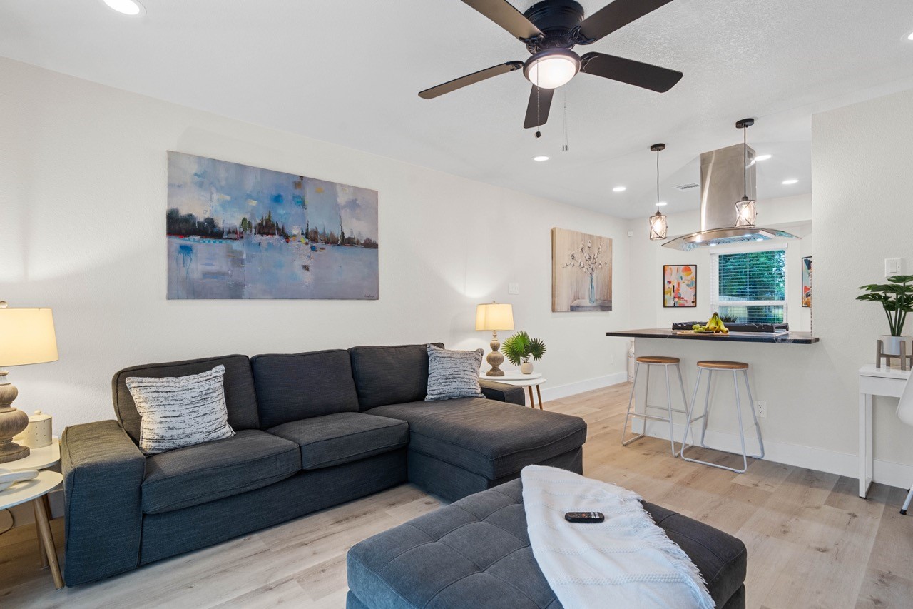 3138 Sunbeam Street Houston, TX 77051 - Photo 14 of 50 From the designer lighting to the elegant neutral palette, every detail in this inviting living area was curated to feel warm, elevated, and move-in ready.