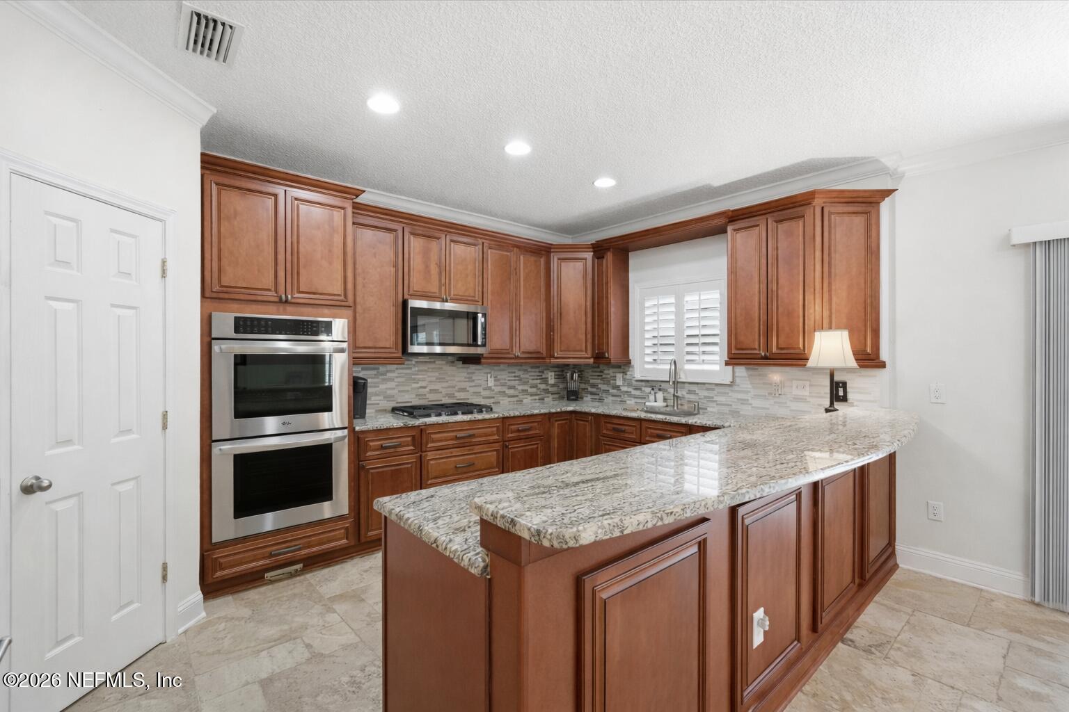 1225 Splendid Ravine Street St. Augustine, FL 32092 - Photo 20 of 83 w kitchen wall