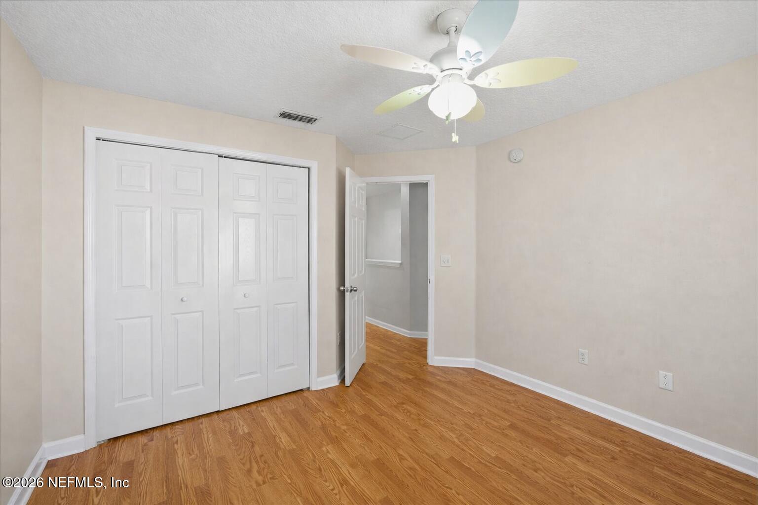 1225 Splendid Ravine Street St. Augustine, FL 32092 - Photo 35 of 83 white baseboard tan bedroom purple 2