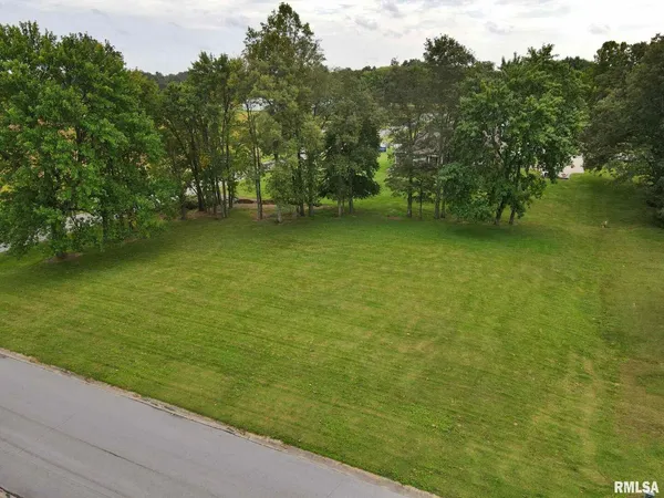 a view of outdoor space with deck and yard
