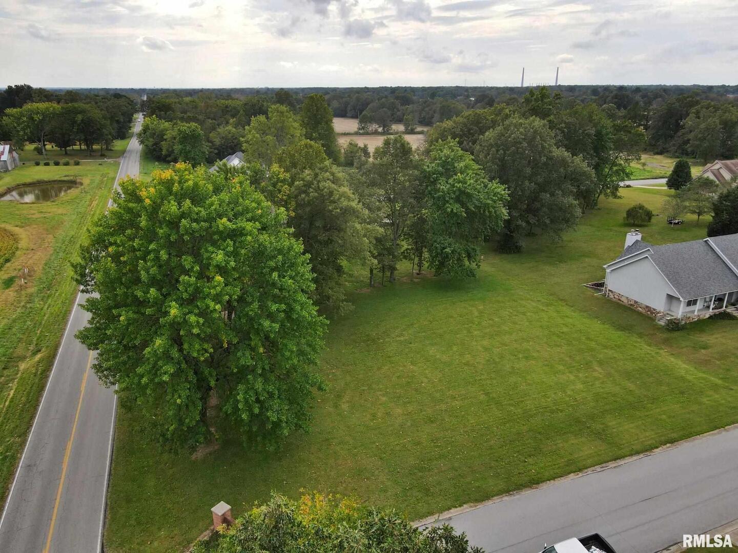 0 Hawthorne Lane Metropolis, IL 62960 - Photo 3 of 12 a view of a lake with a yard