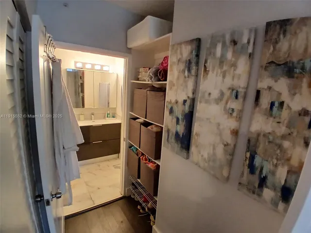a bathroom with a sink and mirror