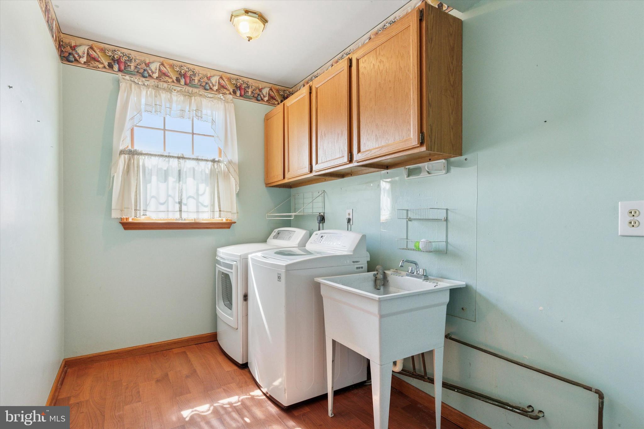 1481 Independence Way Hatfield, PA 19440 - Photo 15 of 35 a utility room with a sink dryer and washer