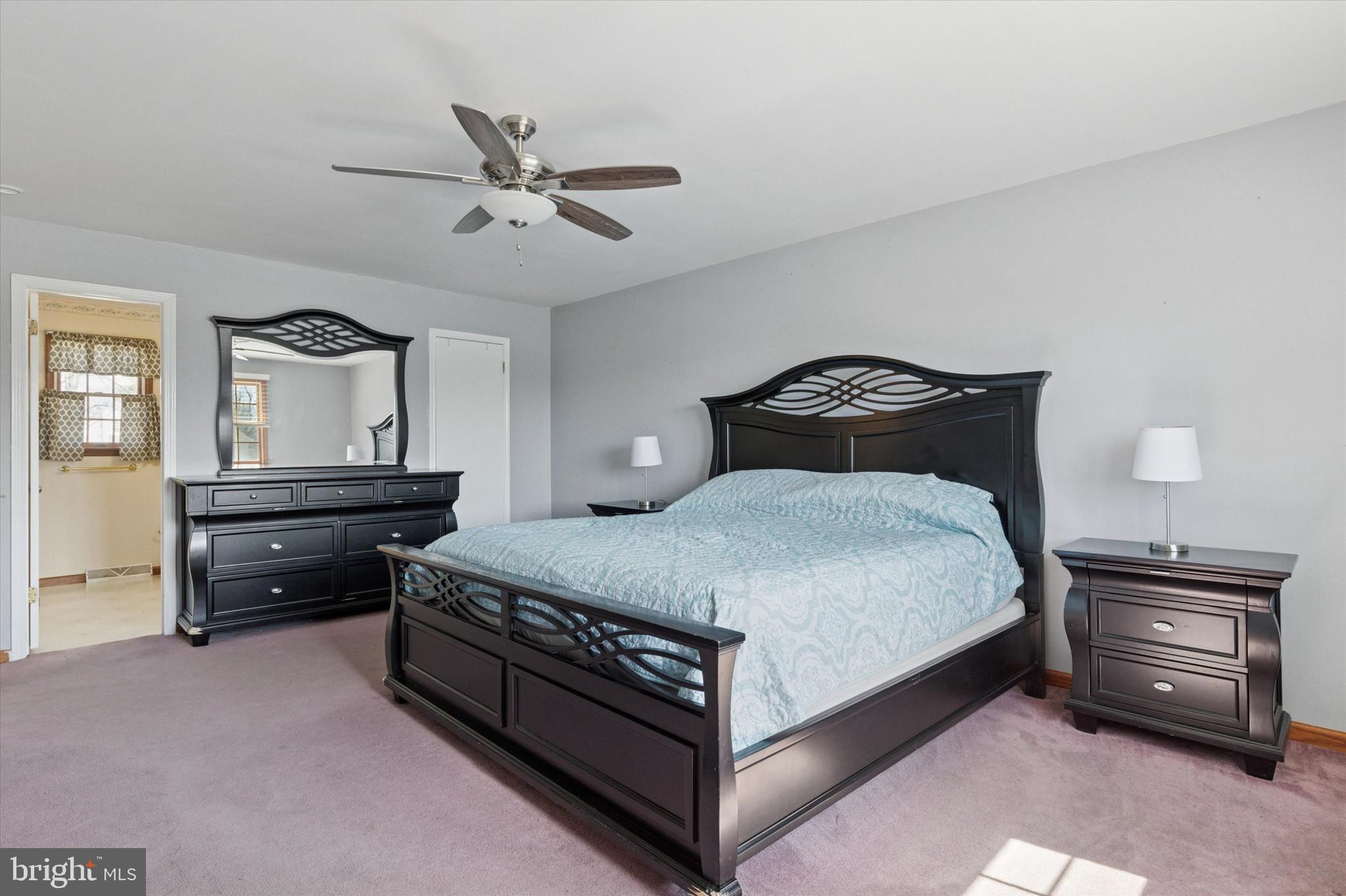 1481 Independence Way Hatfield, PA 19440 - Photo 16 of 35 a bedroom with a bed and a chandelier