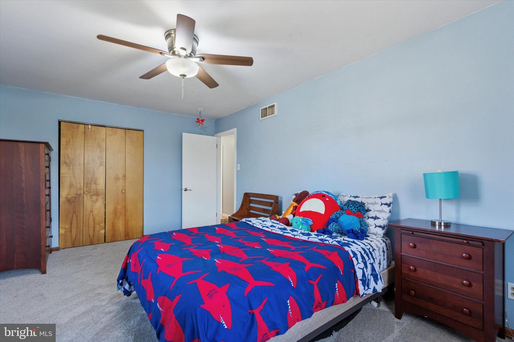 1481 Independence Way Hatfield, PA 19440 - Photo 22 of 35 a bedroom with a bed and a chandelier