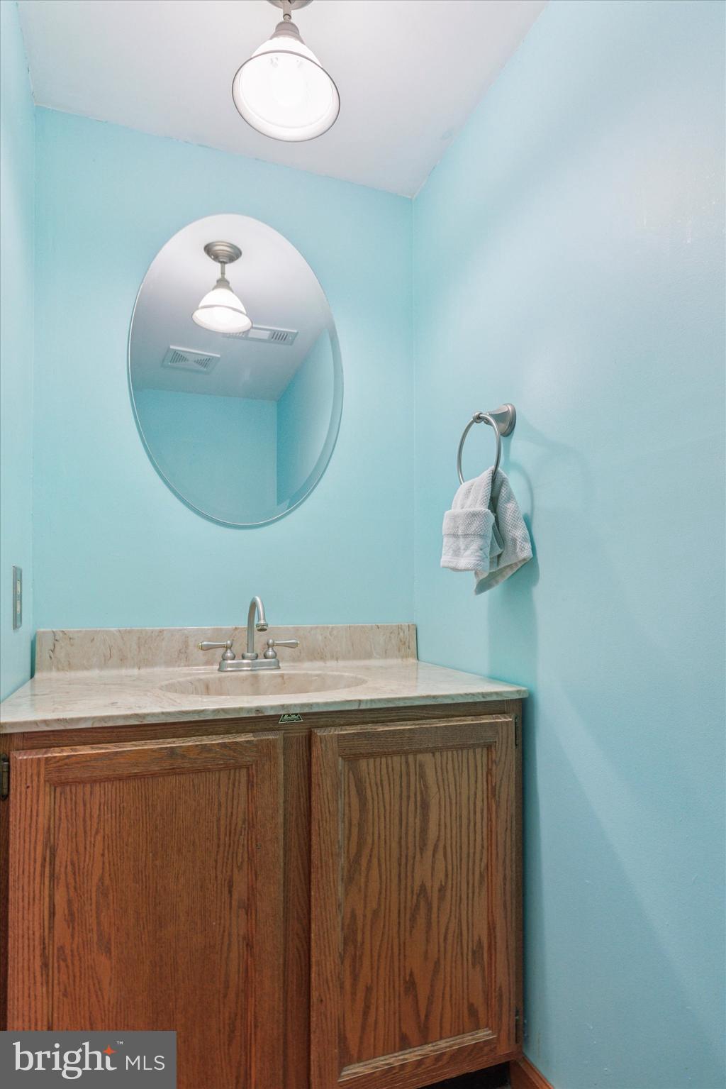 1481 Independence Way Hatfield, PA 19440 - Photo 27 of 35 a bathroom with a sink and mirror