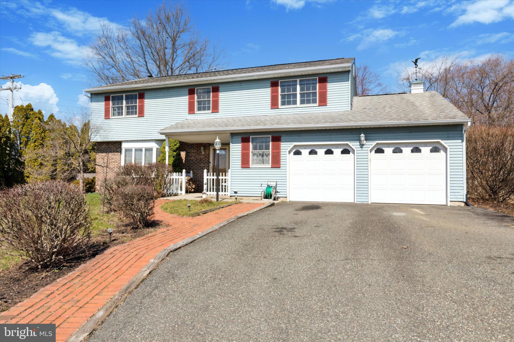 1481 Independence Way Hatfield, PA 19440 - Photo 35 of 35 a front view of a house with a yard and garage