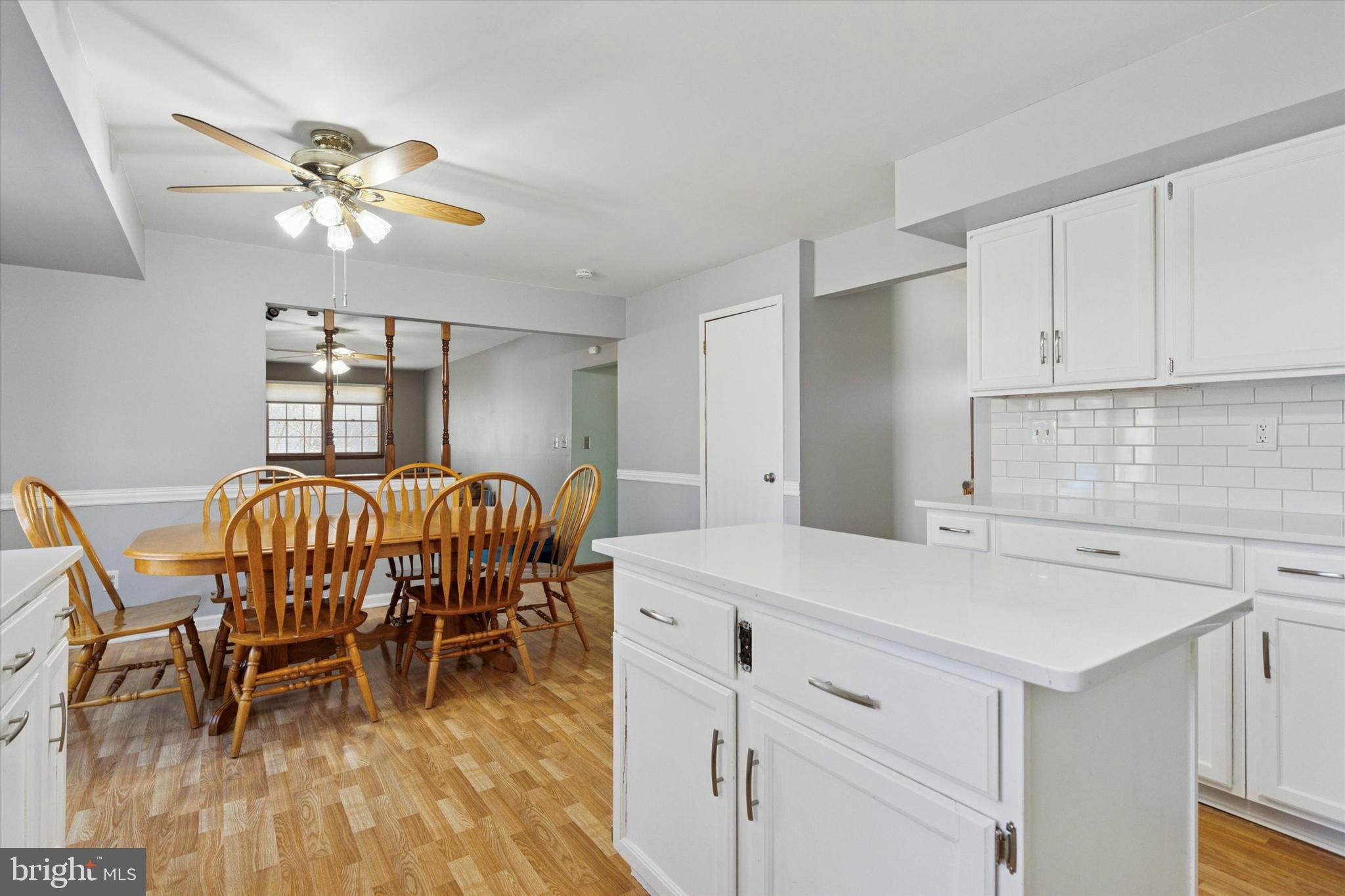 1481 Independence Way Hatfield, PA 19440 - Photo 5 of 35 a kitchen with a dining table chairs and white cabinets