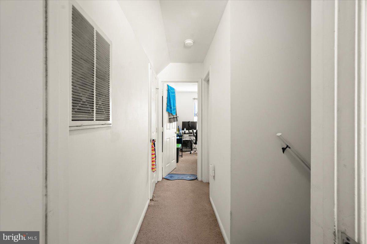 118 Ranson Estates Circle Ranson, WV 25438 - Photo 18 of 34 a view of a hallway with wooden shelves