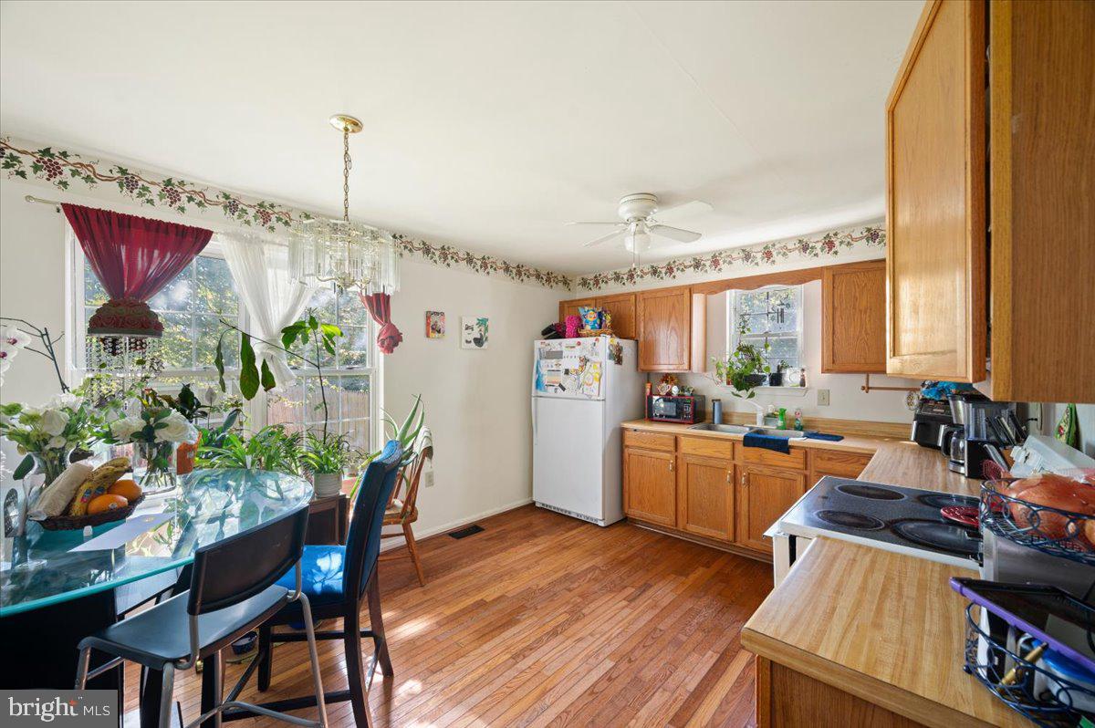 118 Ranson Estates Circle Ranson, WV 25438 - Photo 6 of 34 a living room with furniture and a potted plant