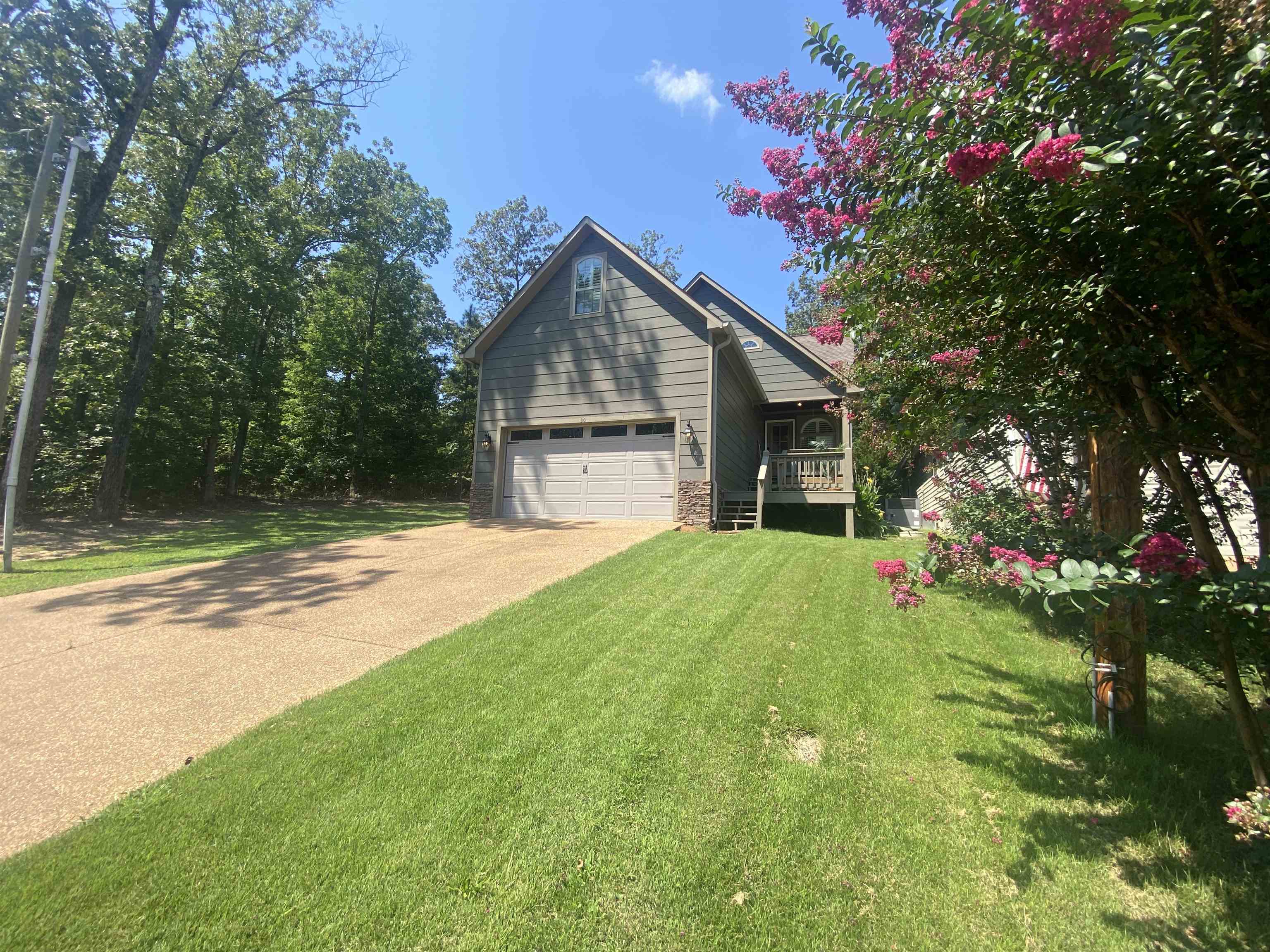 30 Masters Court Counce, TN 38326 - Photo 26 of 27 a house is sitting in middle od the grass