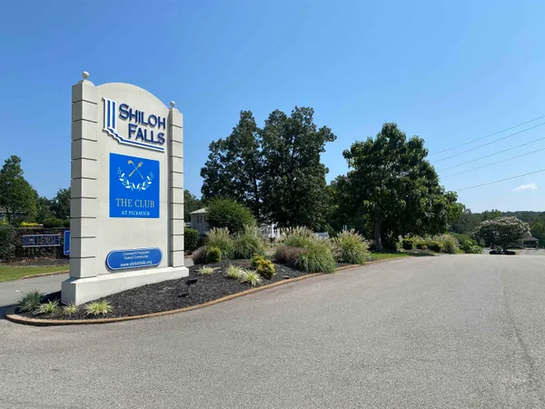 a sign that is on the side of a road