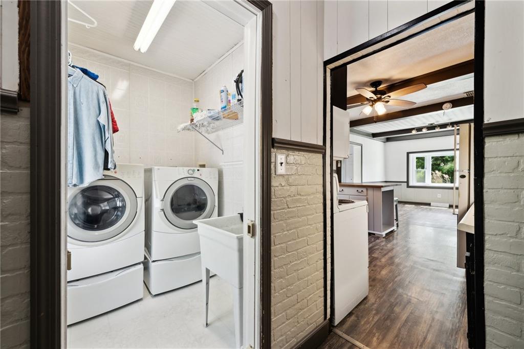 729 Athena Drive Export, PA 15632 - Photo 11 of 31 a view of a hallway with washer and dryer