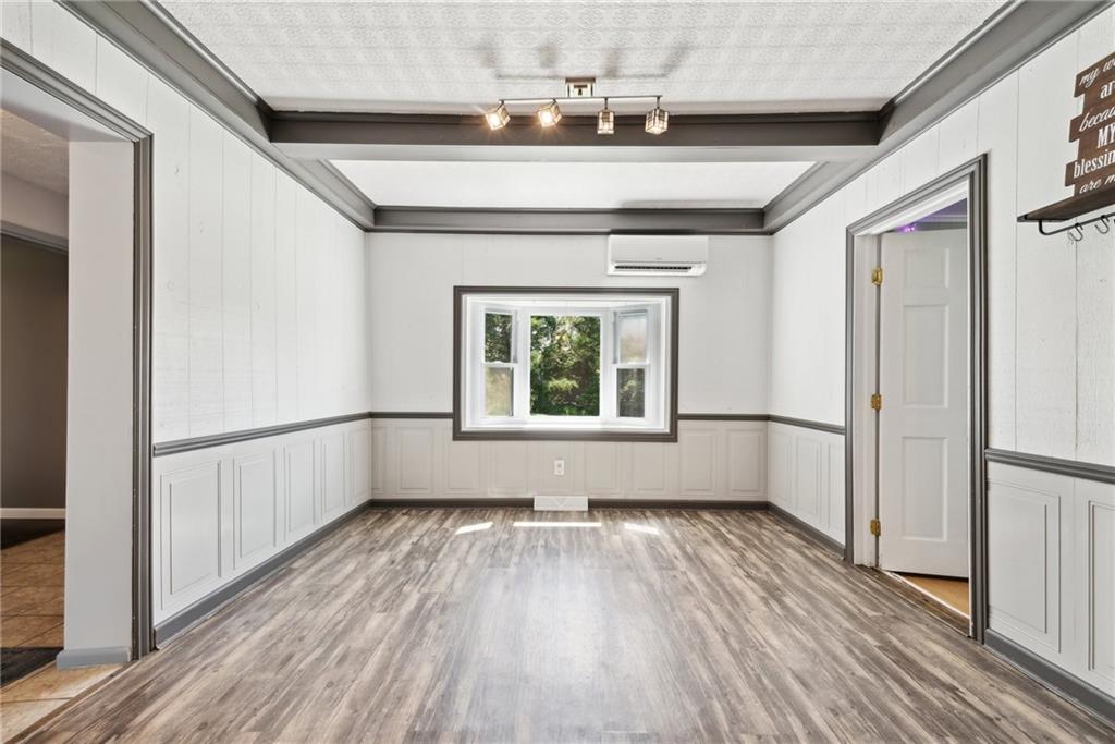 729 Athena Drive Export, PA 15632 - Photo 12 of 31 a view of empty room with wooden floor and fan