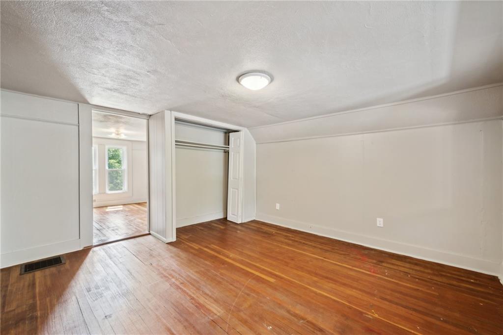 729 Athena Drive Export, PA 15632 - Photo 17 of 31 wooden floor in an empty room