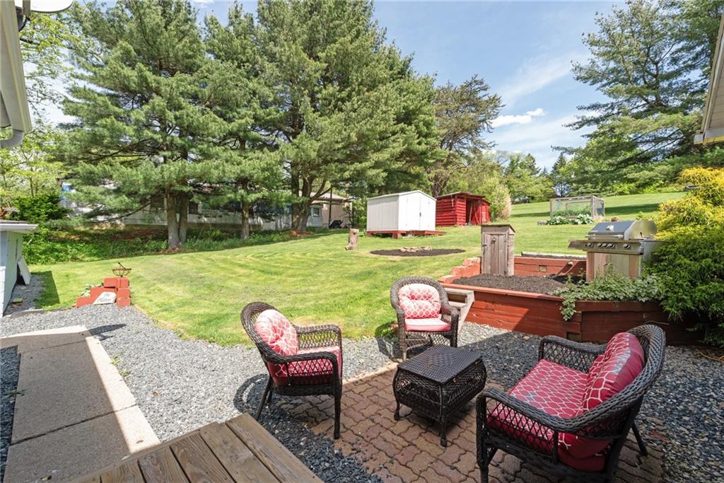 729 Athena Drive Export, PA 15632 - Photo 23 of 31 an outdoor sitting area with furniture and garden