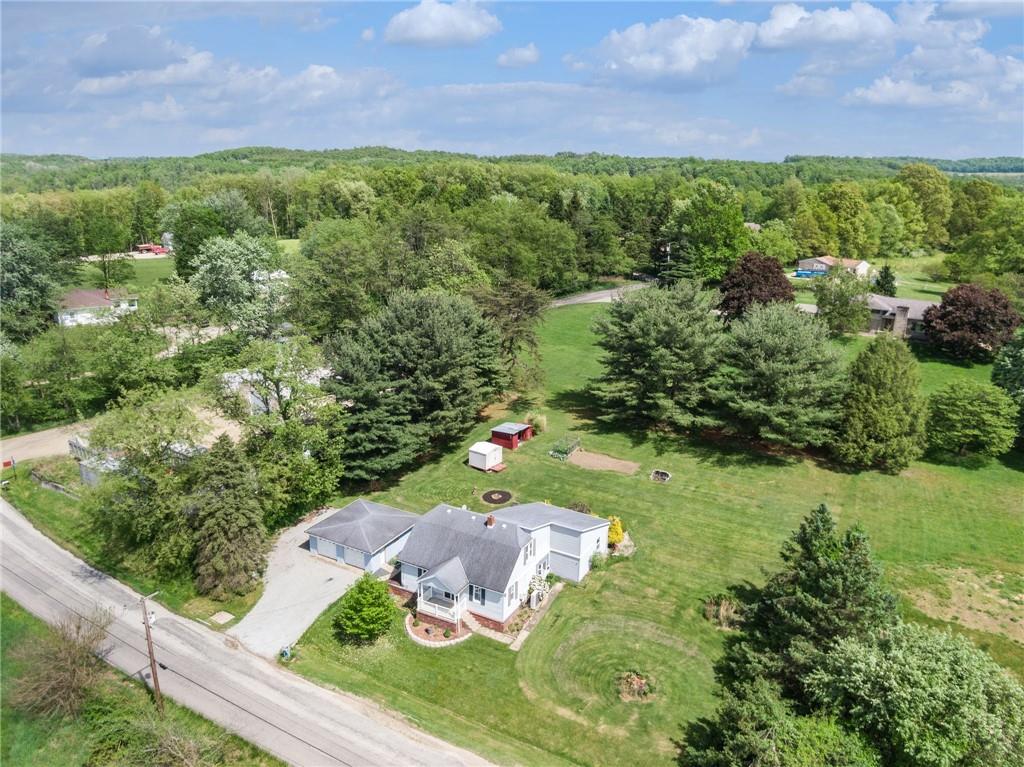 729 Athena Drive Export, PA 15632 - Photo 29 of 31 a view of a house with a yard and potted plants