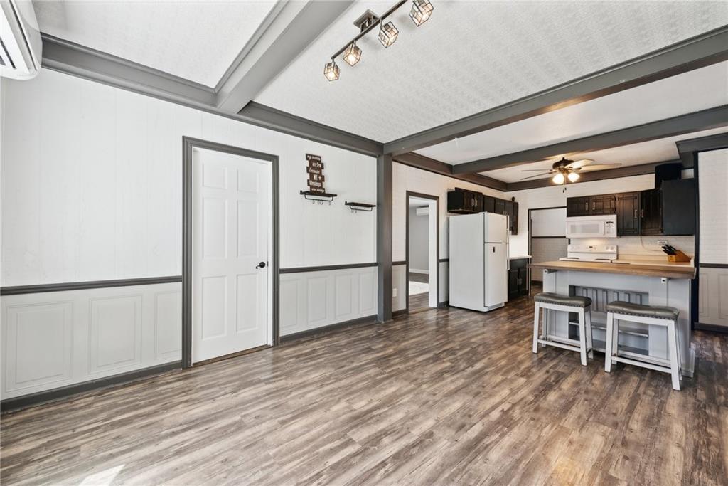 729 Athena Drive Export, PA 15632 - Photo 10 of 31 a view of a workspace with furniture and wooden floor