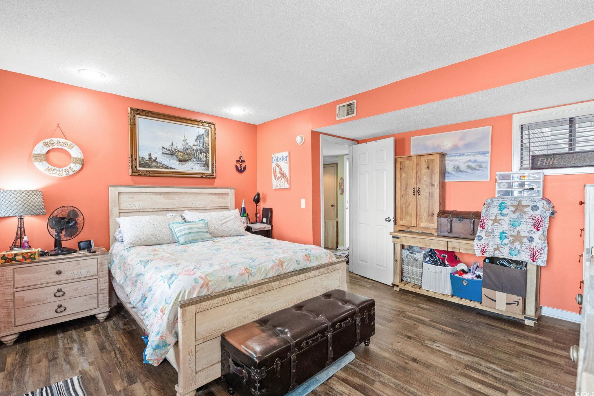 351 Lake Arrowhead Road, Unit 275 Myrtle Beach, SC 29572 - Photo 11 of 37 Bedroom featuring dark wood finished floors