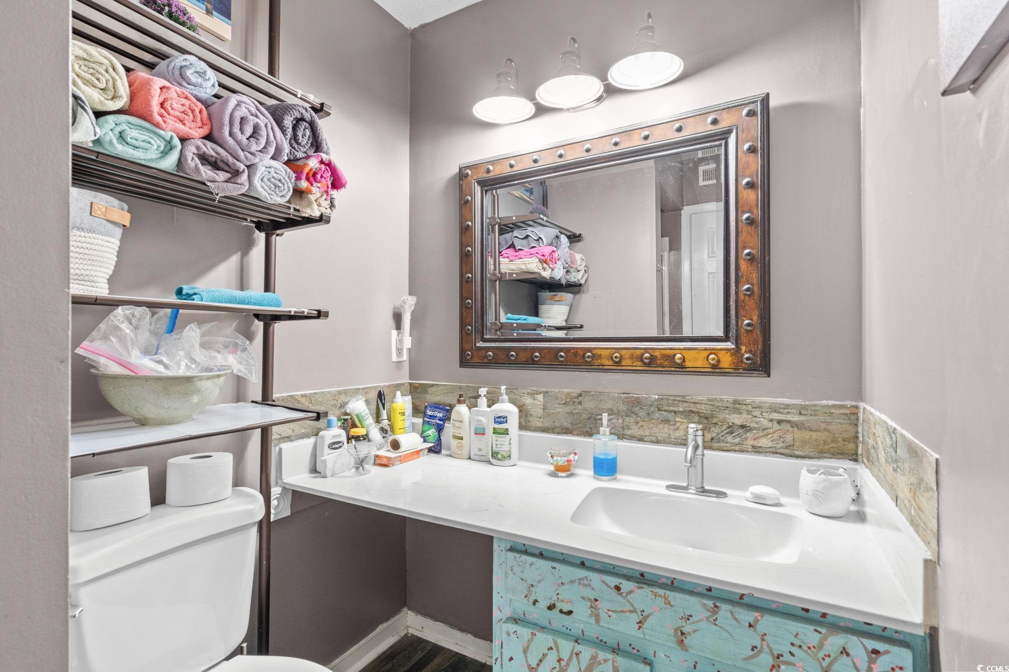 351 Lake Arrowhead Road, Unit 275 Myrtle Beach, SC 29572 - Photo 17 of 37 Half bathroom featuring toilet and vanity