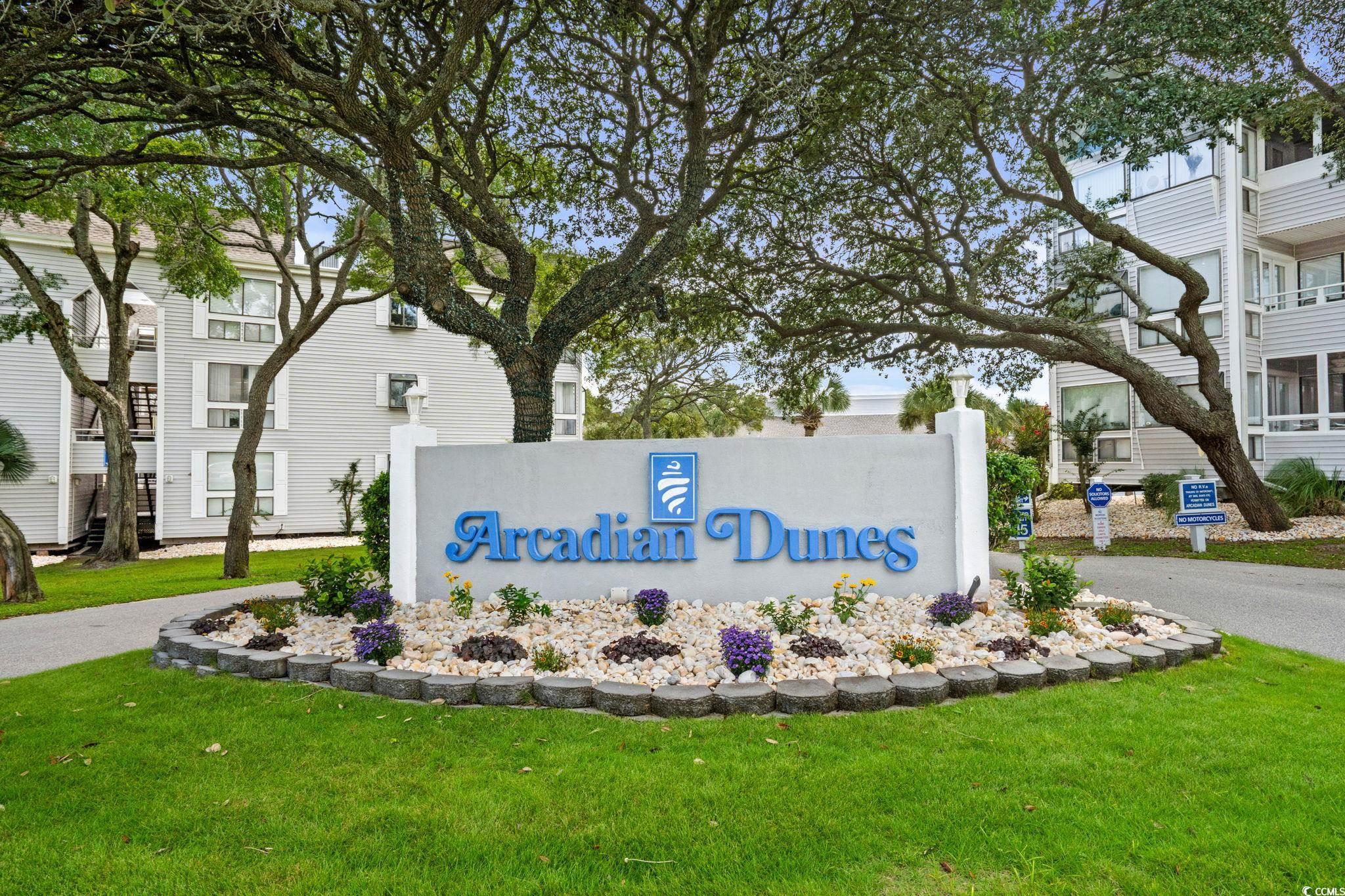 351 Lake Arrowhead Road, Unit 275 Myrtle Beach, SC 29572 - Photo 21 of 37 Community / neighborhood sign featuring a yard