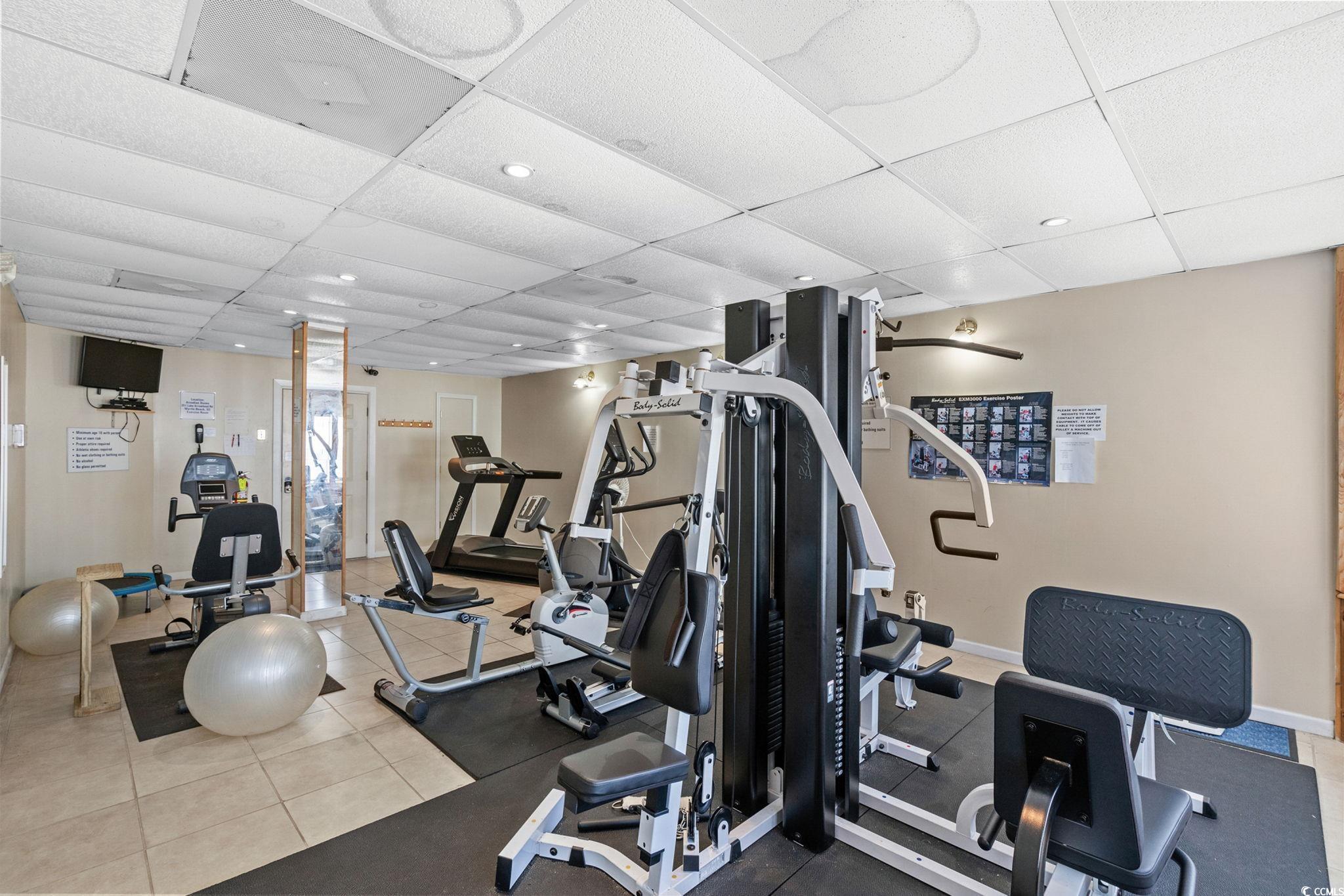 351 Lake Arrowhead Road, Unit 275 Myrtle Beach, SC 29572 - Photo 27 of 37 Workout area featuring a paneled ceiling and recessed lighting