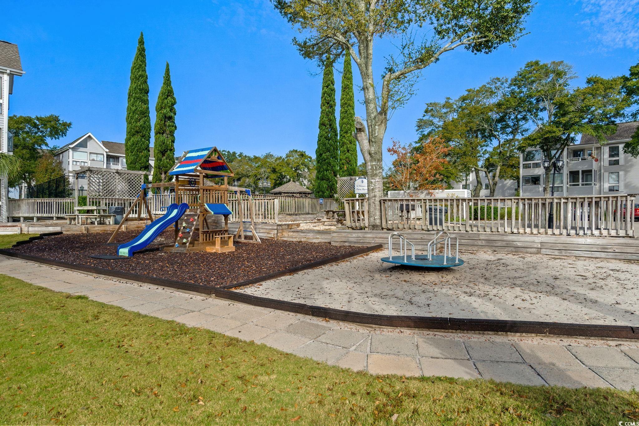 351 Lake Arrowhead Road, Unit 275 Myrtle Beach, SC 29572 - Photo 28 of 37 Community playground featuring a residential view