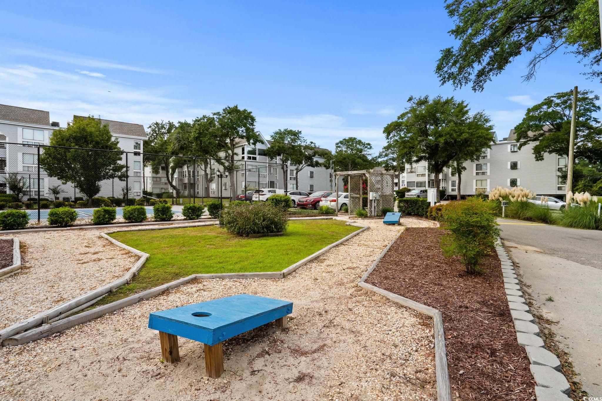 351 Lake Arrowhead Road, Unit 275 Myrtle Beach, SC 29572 - Photo 31 of 37 View of community featuring a residential view and a yard