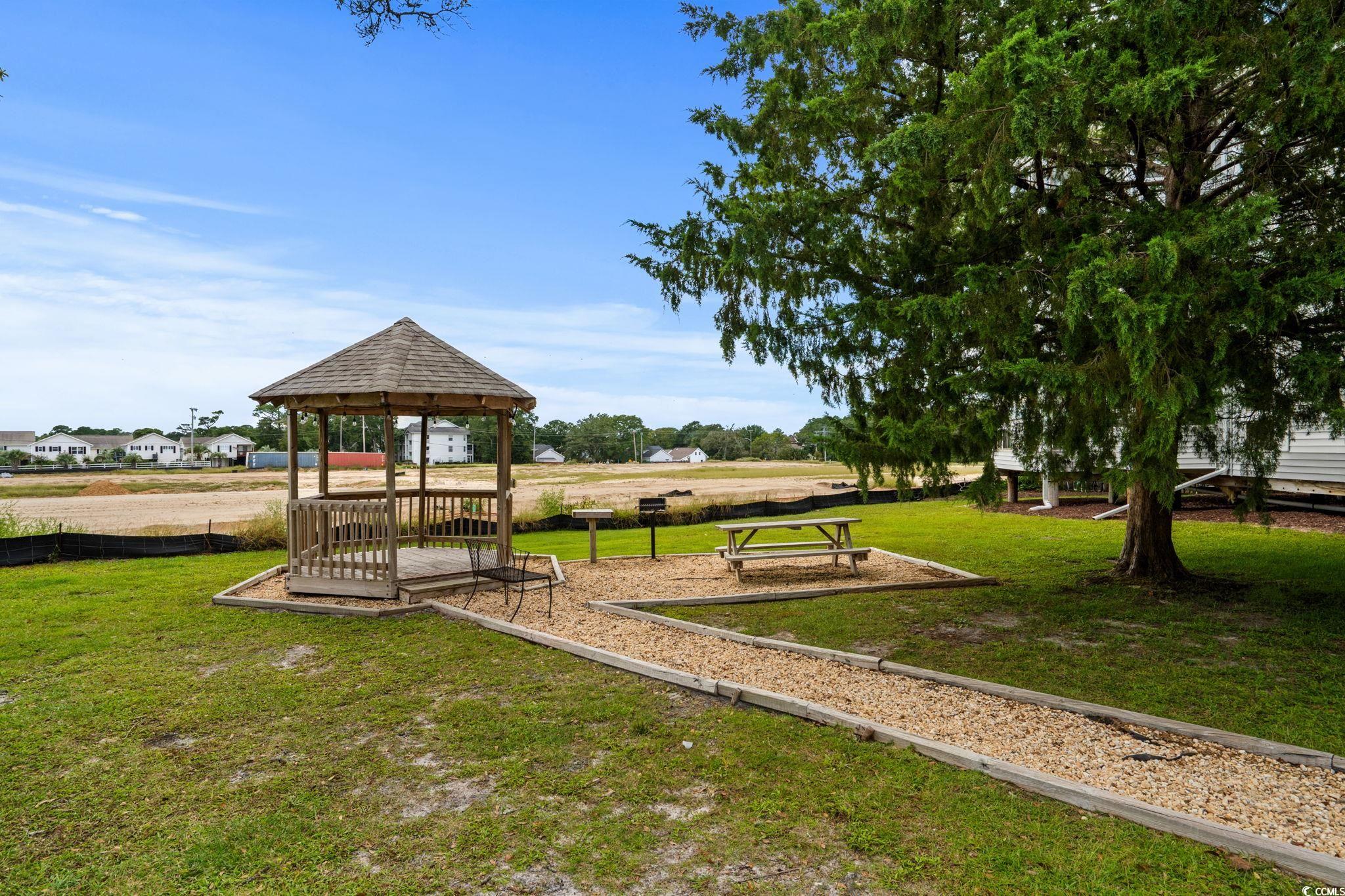 351 Lake Arrowhead Road, Unit 275 Myrtle Beach, SC 29572 - Photo 32 of 37 Surrounding community with a gazebo and a lawn
