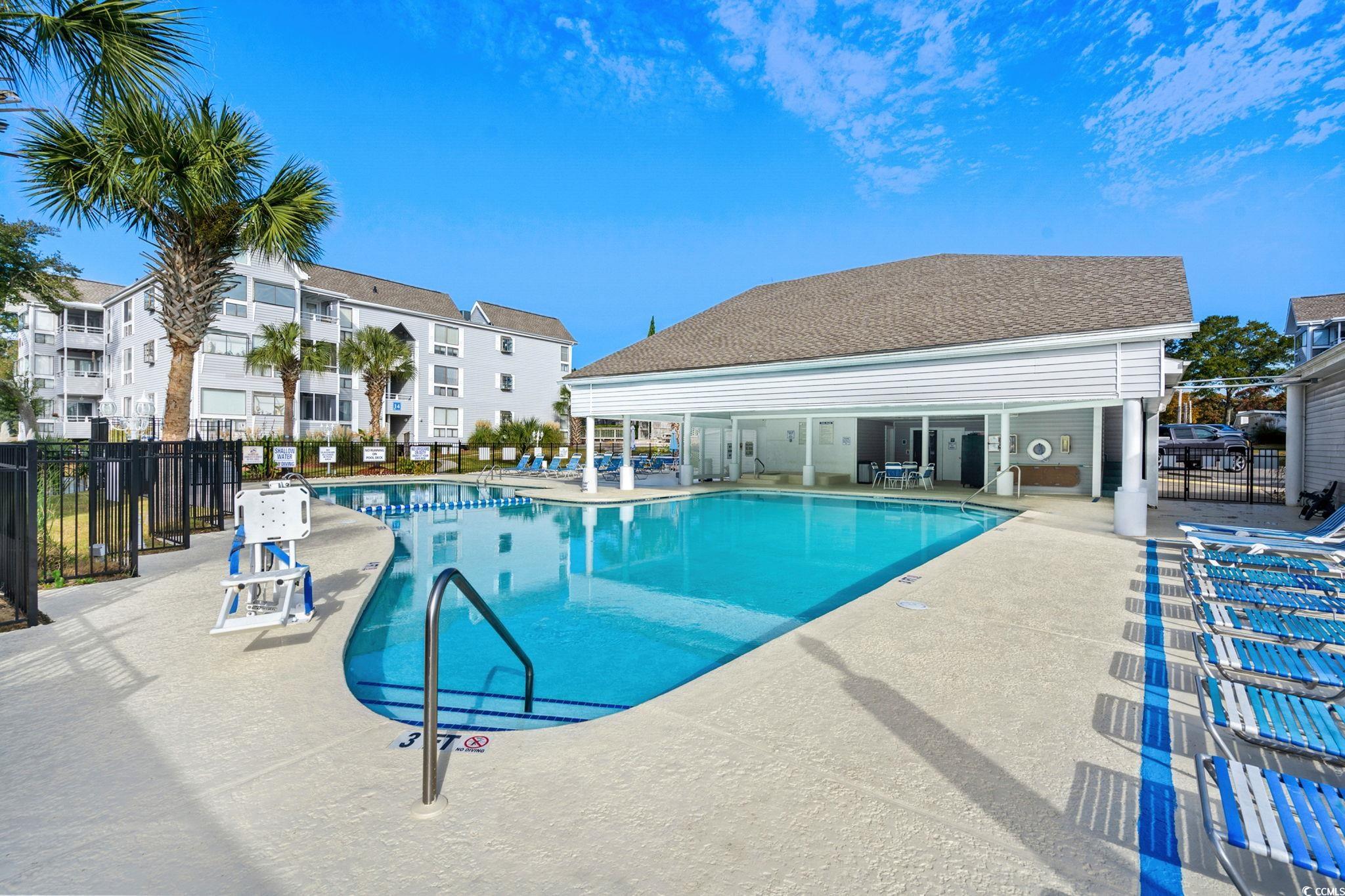 351 Lake Arrowhead Road, Unit 275 Myrtle Beach, SC 29572 - Photo 35 of 37 Community pool with a patio area