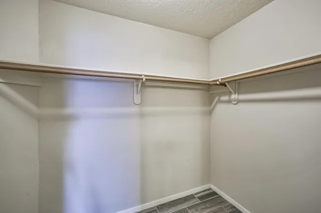 a view of a room with racks on the wall