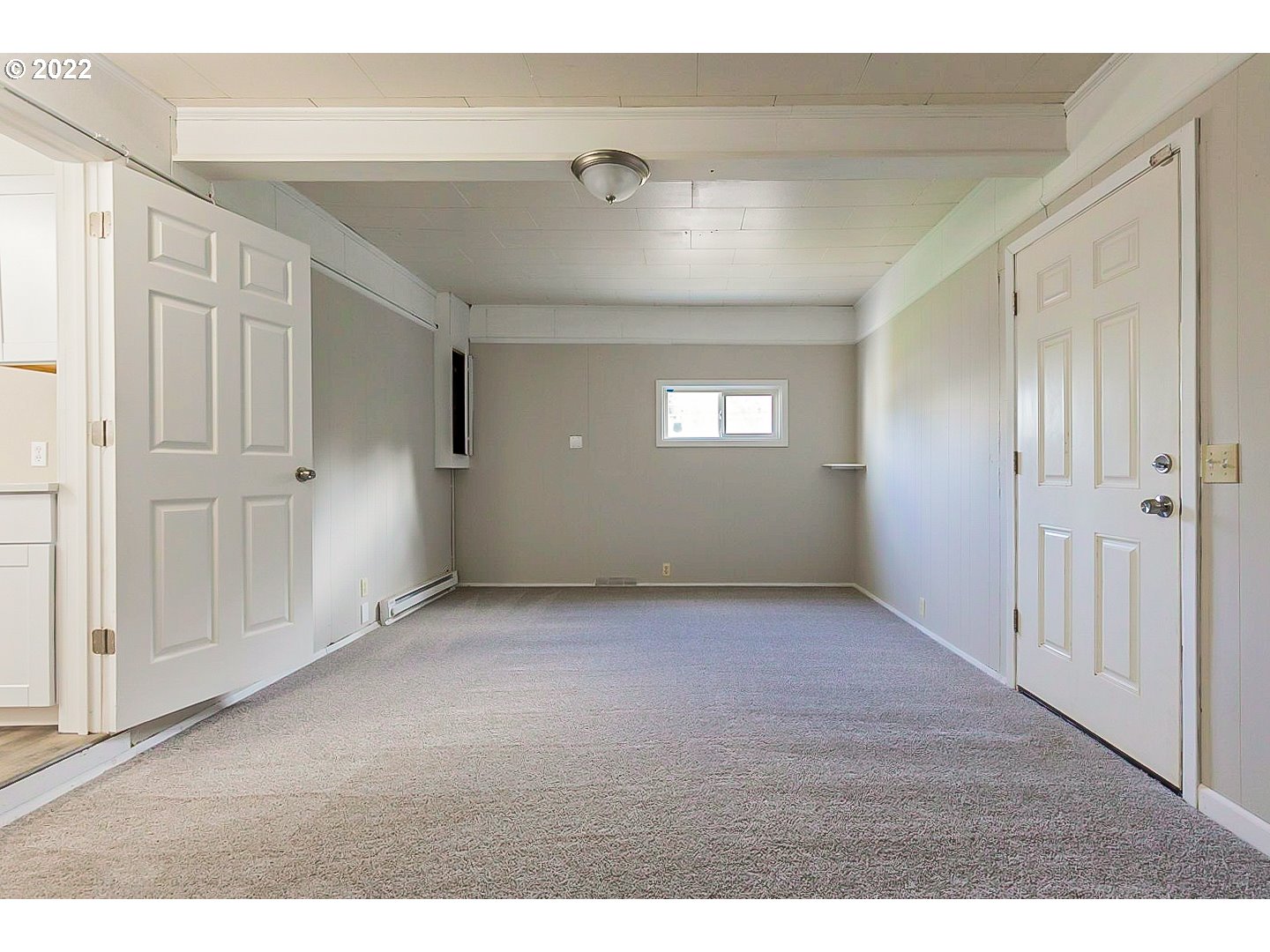 6930 Northeast Roselawn Street Portland, OR 97218 - Photo 15 of 31 a view of an empty room