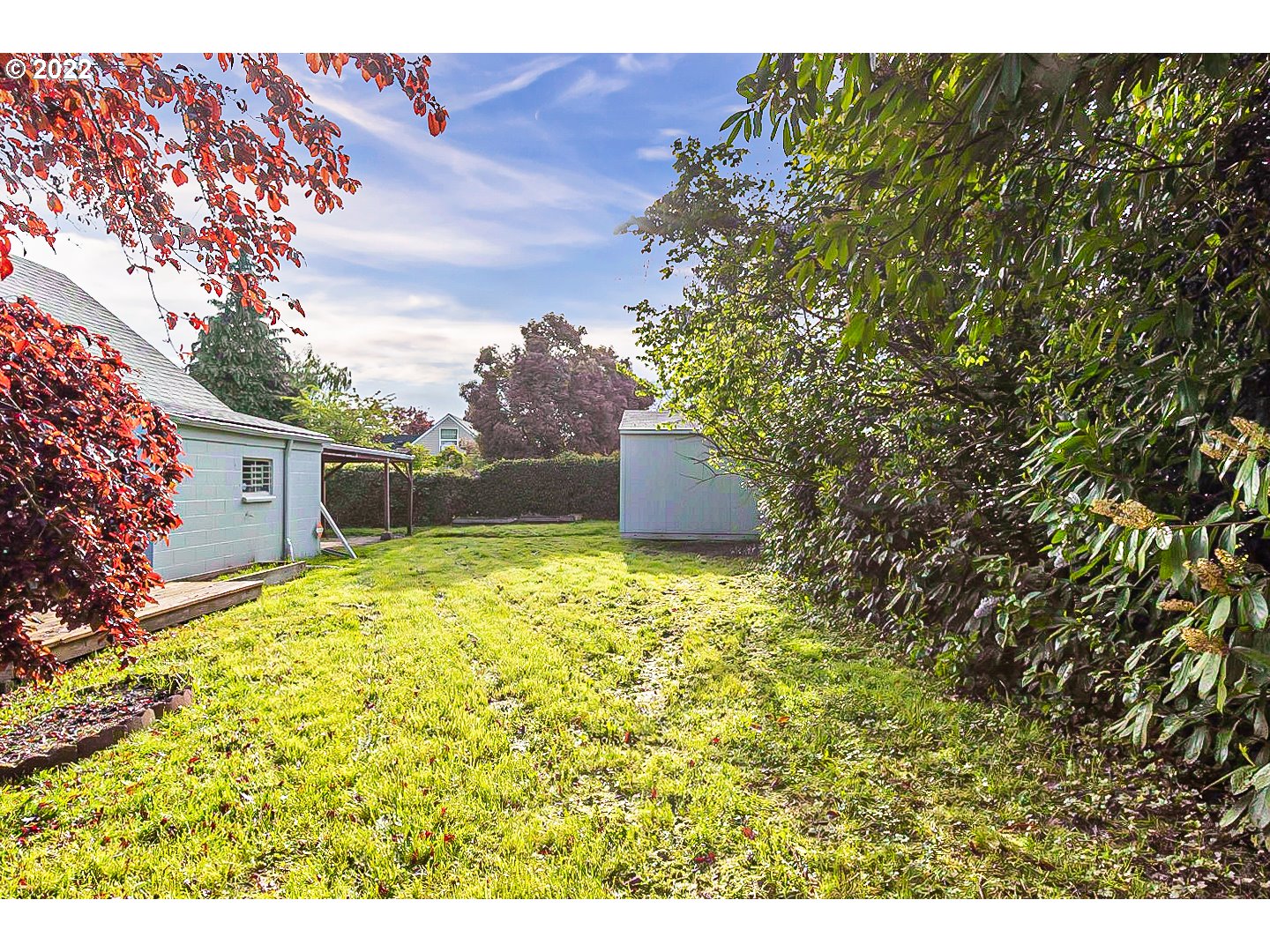 6930 Northeast Roselawn Street Portland, OR 97218 - Photo 31 of 31 a backyard of a house