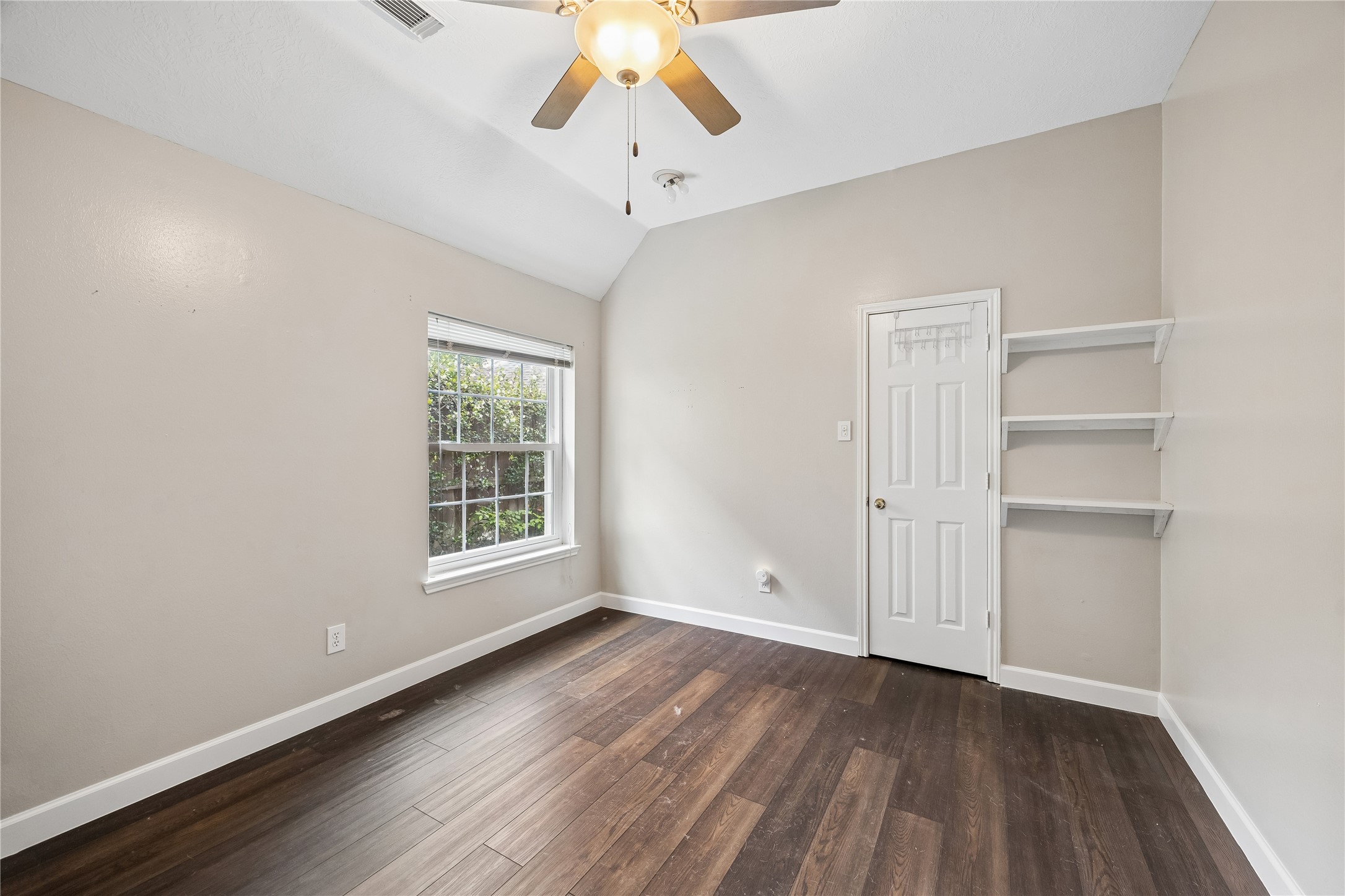 9110 Rhapsody Lane Houston, TX 77040 - Photo 17 of 20 Bedroom 3 with new flooring.