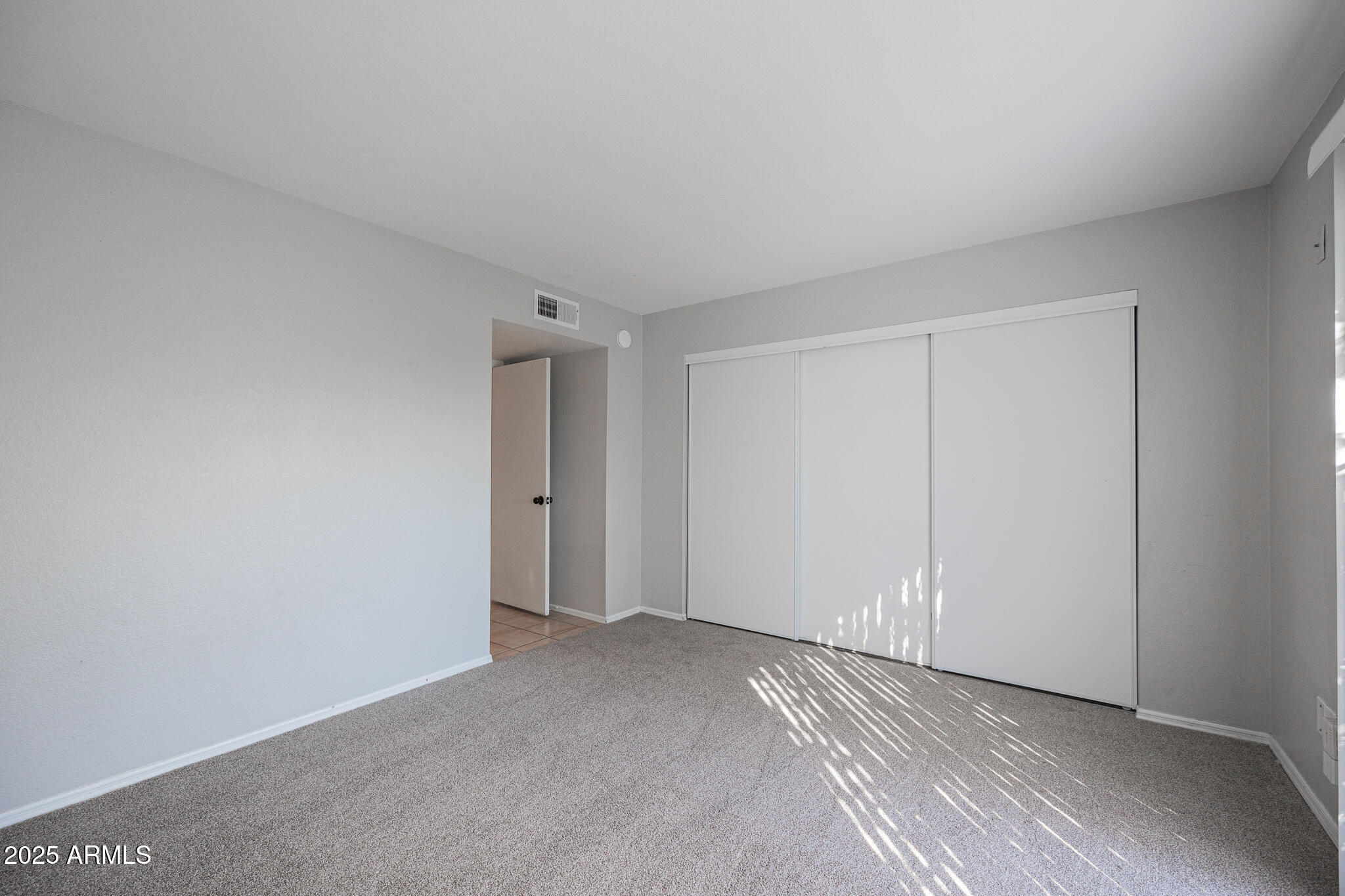 2135 South Dorsey Lane Tempe, AZ 85282 - Photo 13 of 24 a view of an empty room