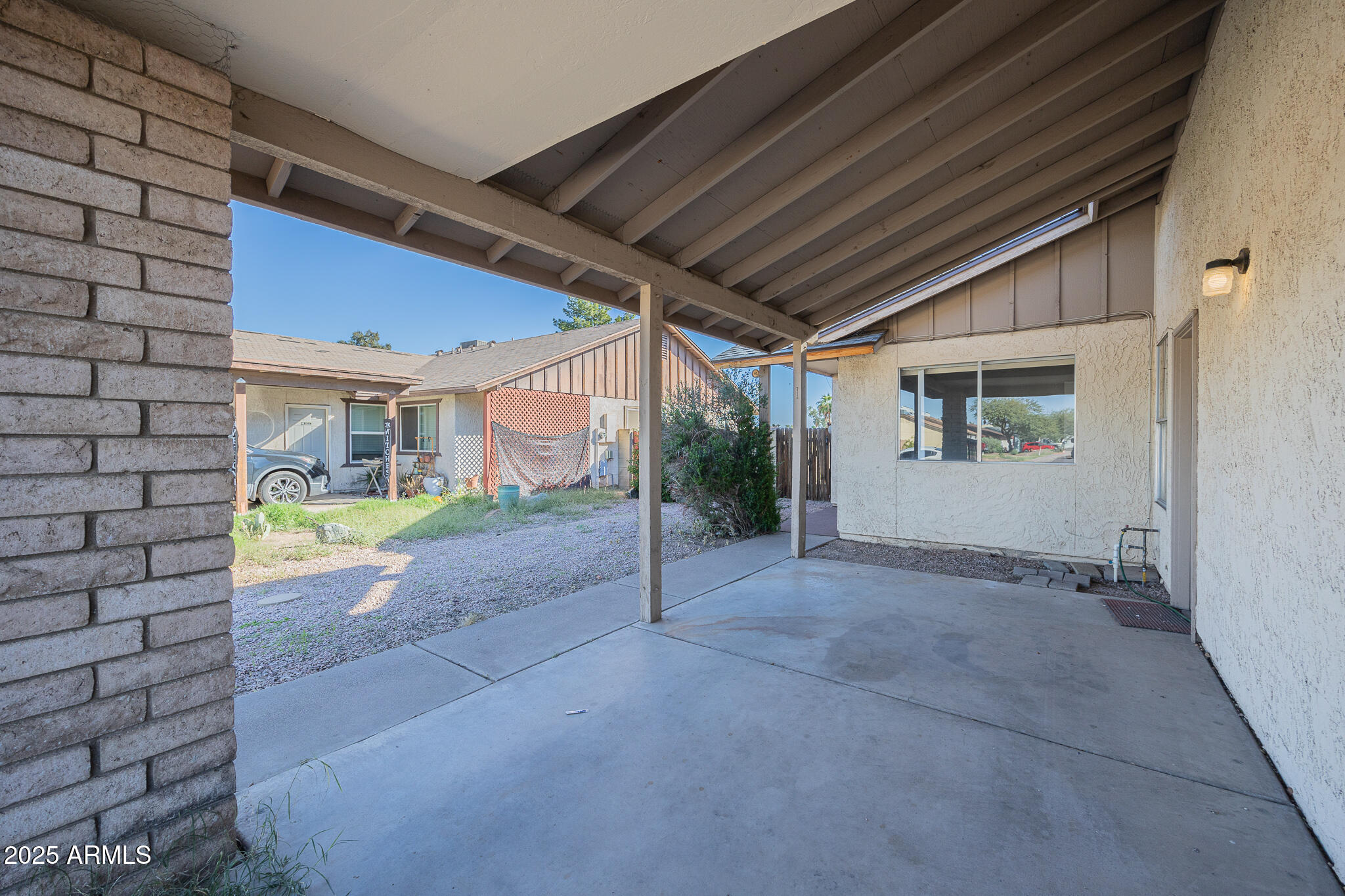 2135 South Dorsey Lane Tempe, AZ 85282 - Photo 3 of 24 a view of a house with a porch