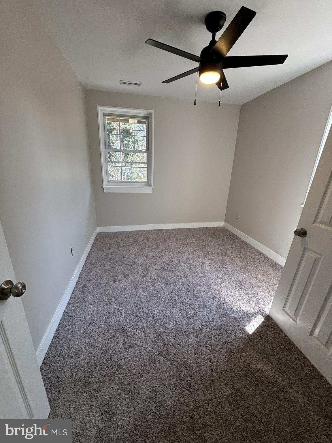 18 West 5th Street, Unit D Media, PA 19063 - Photo 2 of 6 a view of an empty room with a window