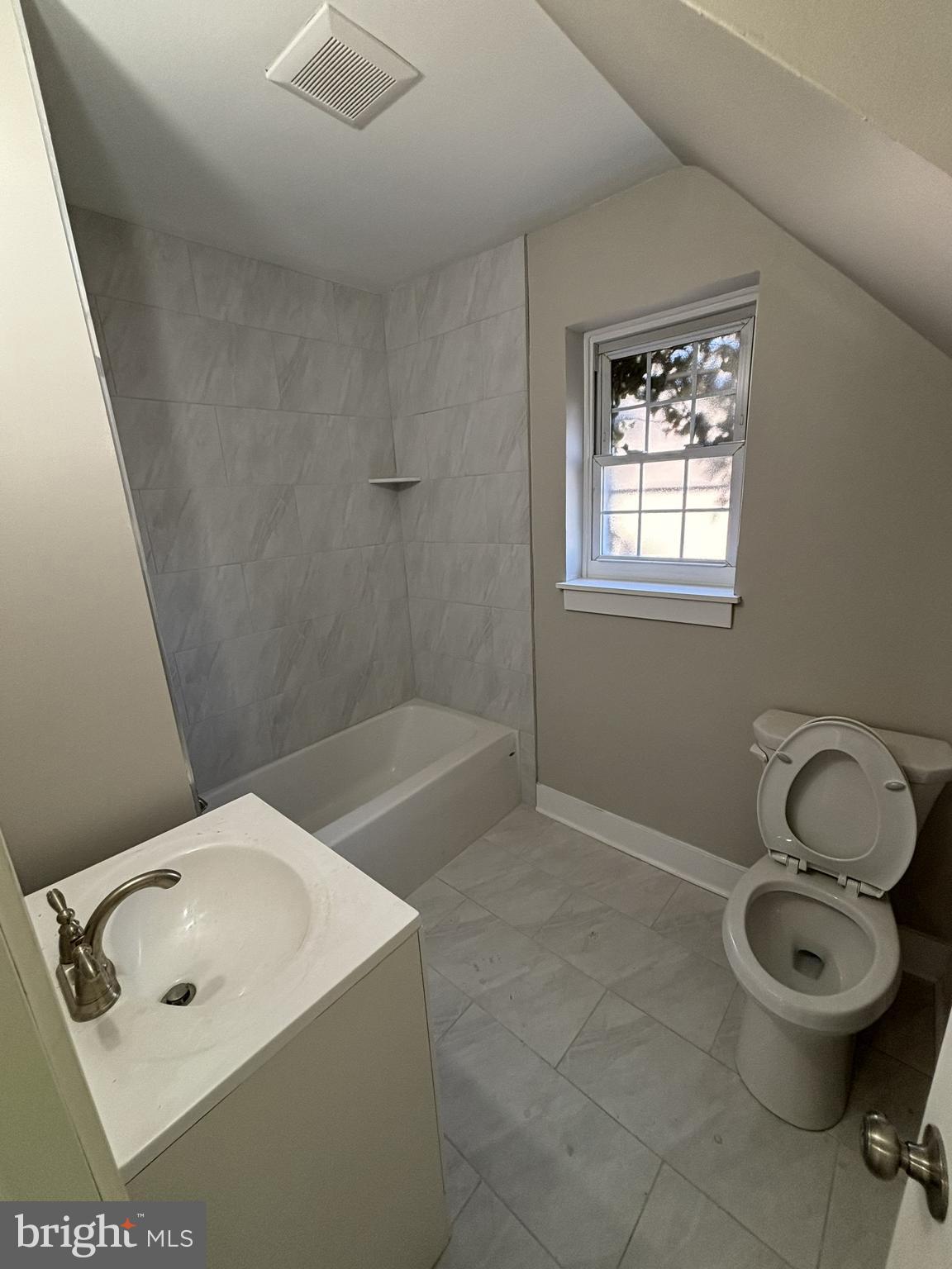 18 West 5th Street, Unit D Media, PA 19063 - Photo 5 of 6 a bathroom with a sink mirror and toilet