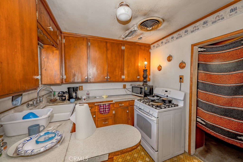 10621 Helendale Avenue Tujunga, CA 91042 - Photo 11 of 20 a room with storage and utility