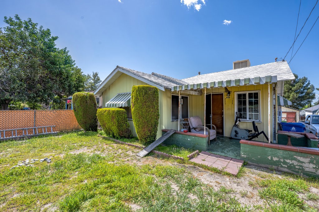 10621 Helendale Avenue Tujunga, CA 91042 - Photo 2 of 20 a view of a house with backyard porch and sitting area