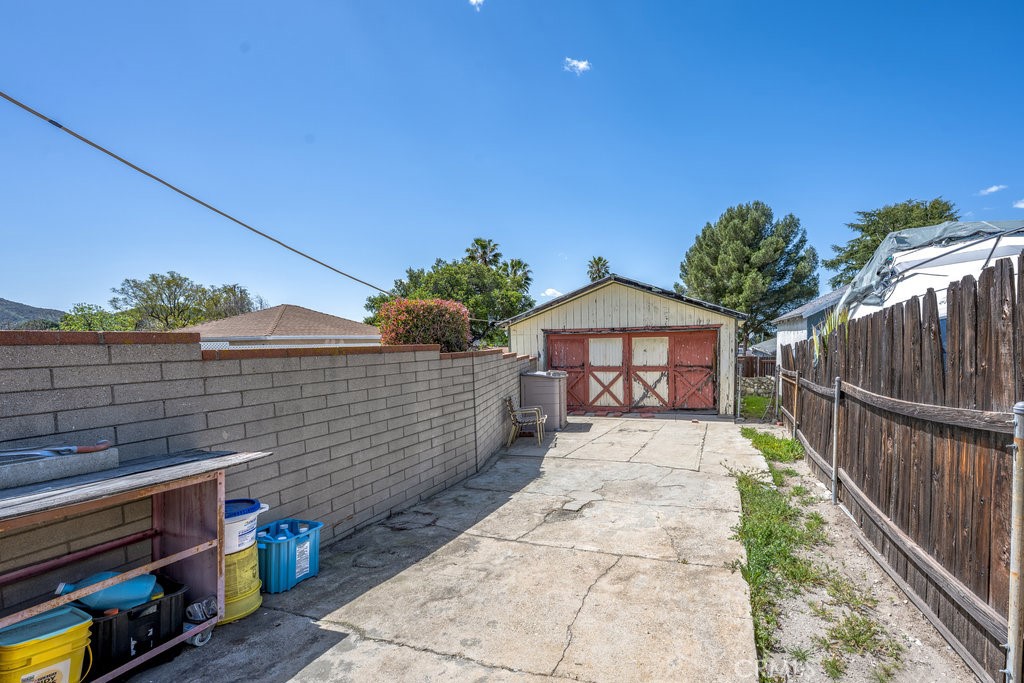 10621 Helendale Avenue Tujunga, CA 91042 - Photo 4 of 20 a view of a pathway both side of building