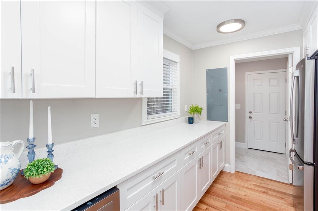 3831 Dillard Street Powder Springs, GA 30127 - Photo 11 of 30 a kitchen with a sink and cabinets