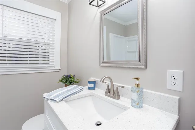 a bathroom with a sink and a toilet