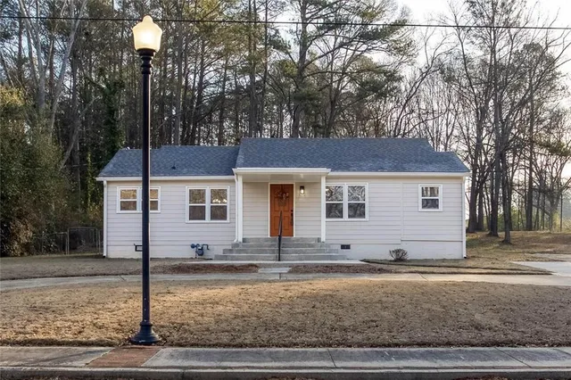 a view of a house with street