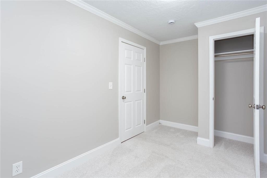 3831 Dillard Street Powder Springs, GA 30127 - Photo 21 of 30 a view of an empty room with closet area