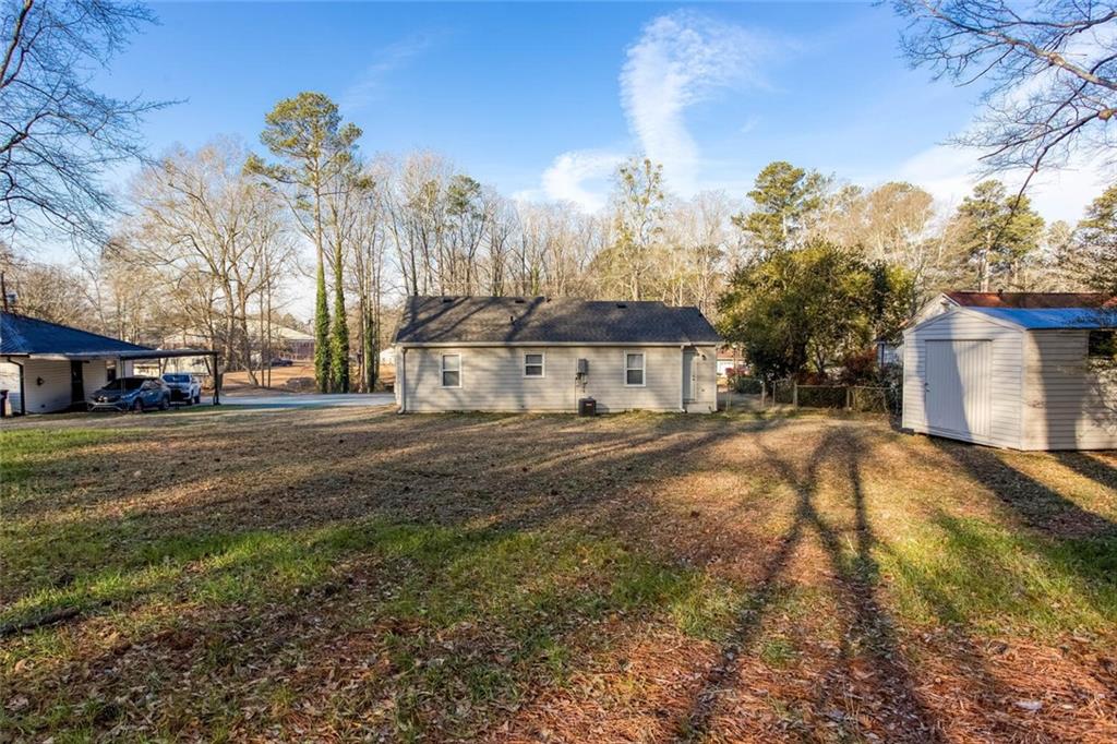 3831 Dillard Street Powder Springs, GA 30127 - Photo 22 of 30 a view of street with houses