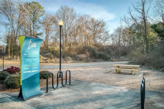 a view of street with sitting area